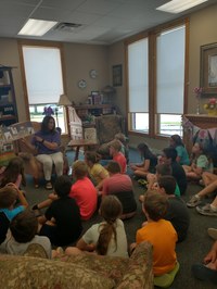 Summer School 2nd grade Class being read to by guest reader, Cindy Page